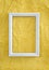 Frame on yellow wrinkled paper