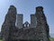 Framed castle in crumbling Reculver Tower and Roman fort ruins