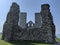 Framed castle in crumbling Reculver Tower and Roman fort ruins