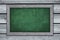 Framed green chalkboard on wood background -. copy space