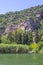 Framed by a spectacular view of Lycian King Rock Tombs in Dalyan.