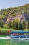 Framed by a spectacular view of Lycian King Rock Tombs in Dalyan.