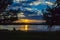 Framed Sunset with beautiful skyline over lake Zorinsky Omaha Nebraska