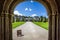 Framed view of Lanhydrock Country House and magnificent topiary and formal garden in front in Cornwall, England