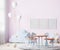 Frames mock up in children room interior in light pink tones with kids table and chairs, soft toys and balloons, 3d rendering