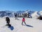 France Alpes Savoie Maurienne Valloire 3 young skiers Aiguilles d Arves sunny blue sky