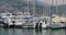 France, Beaulieu, 29 May 2017: Port Saint-Jean-Cap-Ferrat, a fishing boats and yachts, a pier, mountain on the