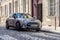 France Beaune 2019-06-19 Gray new shiny car Mini Cooper S parking on cozy European street with paving stones. Concept travel in