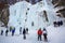 France, Bessans - January 27, 2019: Training athletes at the winter ice climbing wall