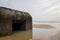 France blockhouse blockhaus in water sea on sand beach atlantic coast