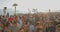 France, Cannes, 23 May 2017: A big beach party on the french coast at sunset, a fashionable dj performs and the crowd