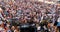 France, Cannes, 23 May 2017: A big beach party on the french coast at sunset, a fashionable dj performs and the crowd