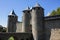 France, Carcassonneâ€” AUGUST 28, 2014. Powerful fortifications and bastions of Carcassonne Castle. Beautiful conical blue roofs