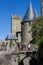 France, Carcassonneâ€” AUGUST 28, 2014. Powerful fortifications and bastions of Carcassonne Castle. Beautiful conical blue roofs