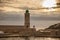 France, Cassis, the port and lighthouse at sunset