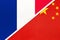France and China or PRC, symbol of national flags from textile. Championship between two countries