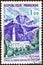 FRANCE - CIRCA 1960: A stamp printed in France shows Cilaos Church and Great Bernard Mountains, Reunion, circa 1960.