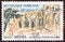 FRANCE - CIRCA 1961: A stamp printed in France shows the Roman gates of Lodi at Algeria, circa 1961.