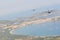 France, Corsica, Calvi, - circa, 2011.Transport aircraft with the legionaires in the sky carry out the assault landing.