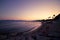 France, Cote D\'Azur, Cannes; Part of the sandy coast across the Cote D\'Azur in the last evening light