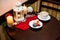 France dessert macaroons and cup cappuccino on table in cafe.