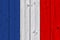 France flag painted on old wood plank