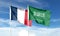 France flag and Saudi Arabia flag on cloudy sky