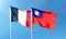 France flag and Taiwan flag against cloudy sky. waving in the sky