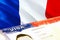 France immigration document close up. Passport visa on France flag. France visitor visa in passport,3D rendering. France multi