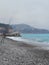 France Nice Cote d Azur pebbles beach sea waves fishing rid