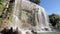 France, Nice, Slow motion footage of famous waterfall in park Castle over old city of Nice at sunny day, a lot of
