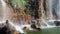 France, Nice, Slow motion footage of famous waterfall in park Castle over old city of Nice at sunny day, a lot of