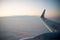 France, October 5, 2019 - Closeup of an airplane KLM wing in the sky at dawn