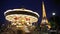 FRANCE, PARIS: Eiffel Tower and Carousel in evening time, time-lapse