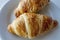 France`s national food croissant on a white plate