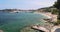 France, Saint-Jean-Cap-Ferrat, 29 May 2017: Coast of cape, families on the beach, bathers, children is playing