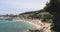 France, Saint-Jean-Cap-Ferrat, 29 May 2017: Coast of cape, families on the beach, bathers, children is playing