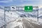 France ski town La Clusaz and Les Houches road big sign with a lot of snow and mountain sky