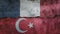 France and Turkey flag on cracked wall background. Economics, politics conflicts, war concept texture background