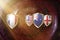 France and Us Australia and Great Britain flags in golden shield on copper texture background.aukus defense pact. france aukus