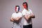 France vs Albania. Football fans of national teams before match on grey background.