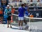 Francisco Cerundolo of Argentina (L) and Felix Auger Aliassime embrace after round of 32 match at 2023 Miami Open