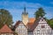 Franconian half-timbered buildings with the Blue Tower built in 1200 of Bad Wimpfen. Neckartal, Baden-Wuerttemberg, Germany,