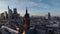 Frankfurt Cathedral in the historic city center Aerial Drone View with Skyscrappers on background at sunset time, Winter
