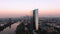 Frankfurt ECB Skyline Aerial Shot at early sunrise reflecting sun