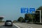 Frankfurt, Germany 29.09.2017 -German highway autobahn blue road sign leading to the airport koeln cologne