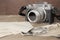 FRANKFURT, GERMANY - JUNE 2020: FUJIFILM XT4 with Fujinon lens, vintage photographs on old wood background, photographic concept,