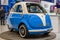 FRANKFURT, GERMANY - SEPT 2019: white blue MICROLINO small electric car, IAA International Motor Show Auto Exhibtion