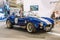 FRANKFURT, GERMANY - SEPT 2019: white blue SHELBY COBRA retro classic car cabrio roadster, IAA International Motor Show Auto