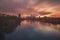 Frankfurt am Main city in the setting sun with reflection in the river